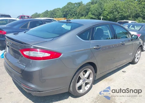 2014 Ford Fusion Hybrid Se z USA, uszkodzony, nr VIN 3FA6P0LU4ER139629